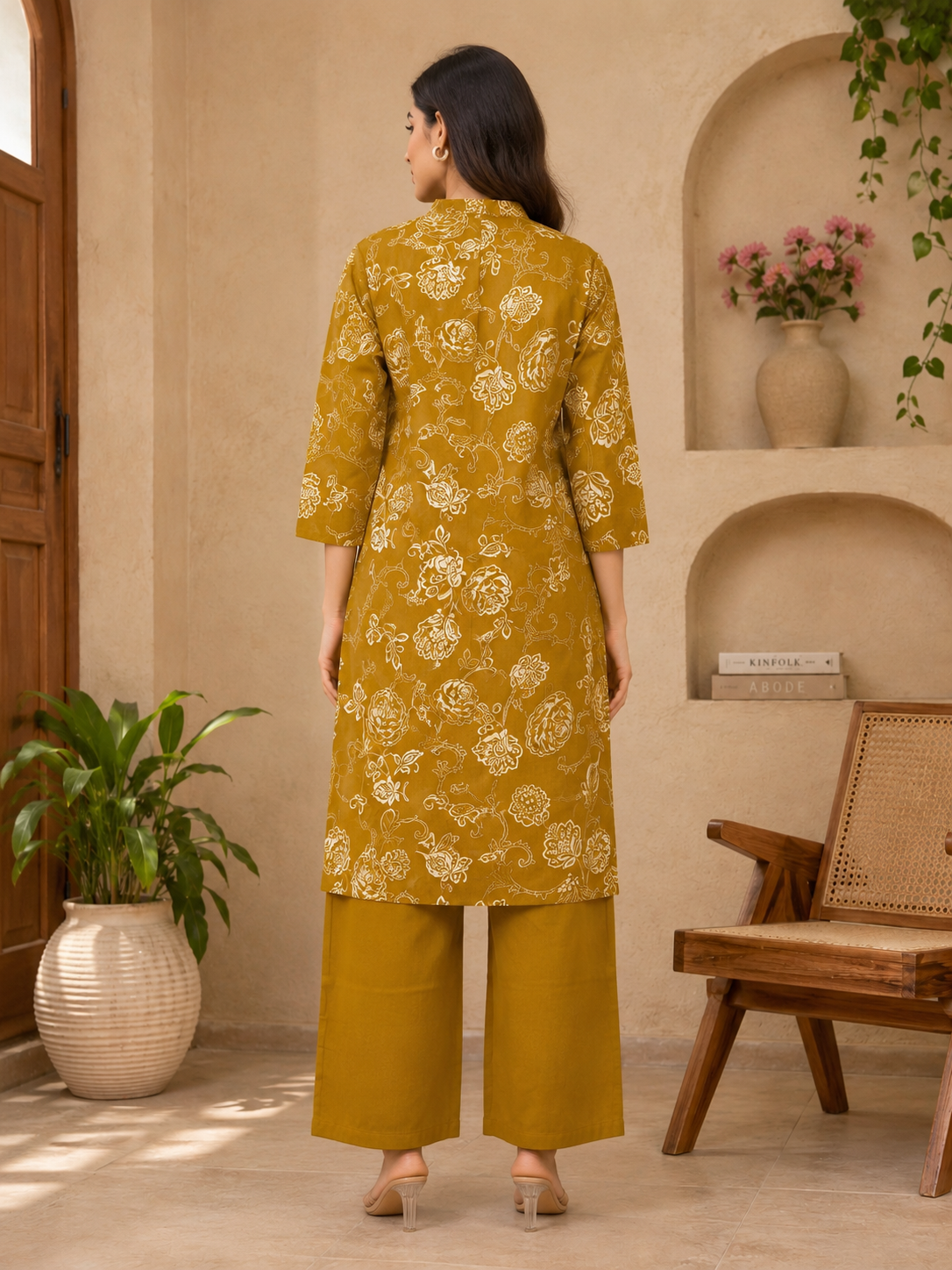 Mustard kurta set back view with floral print