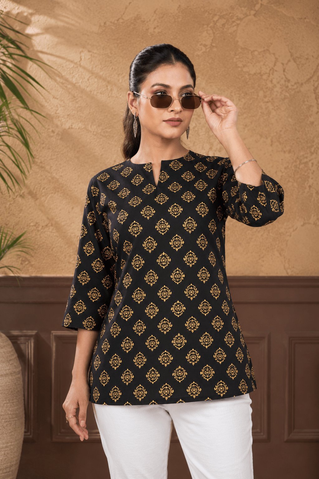 black ethnic printed rayon top women golden print front view